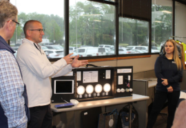 presenter showing lighting controls